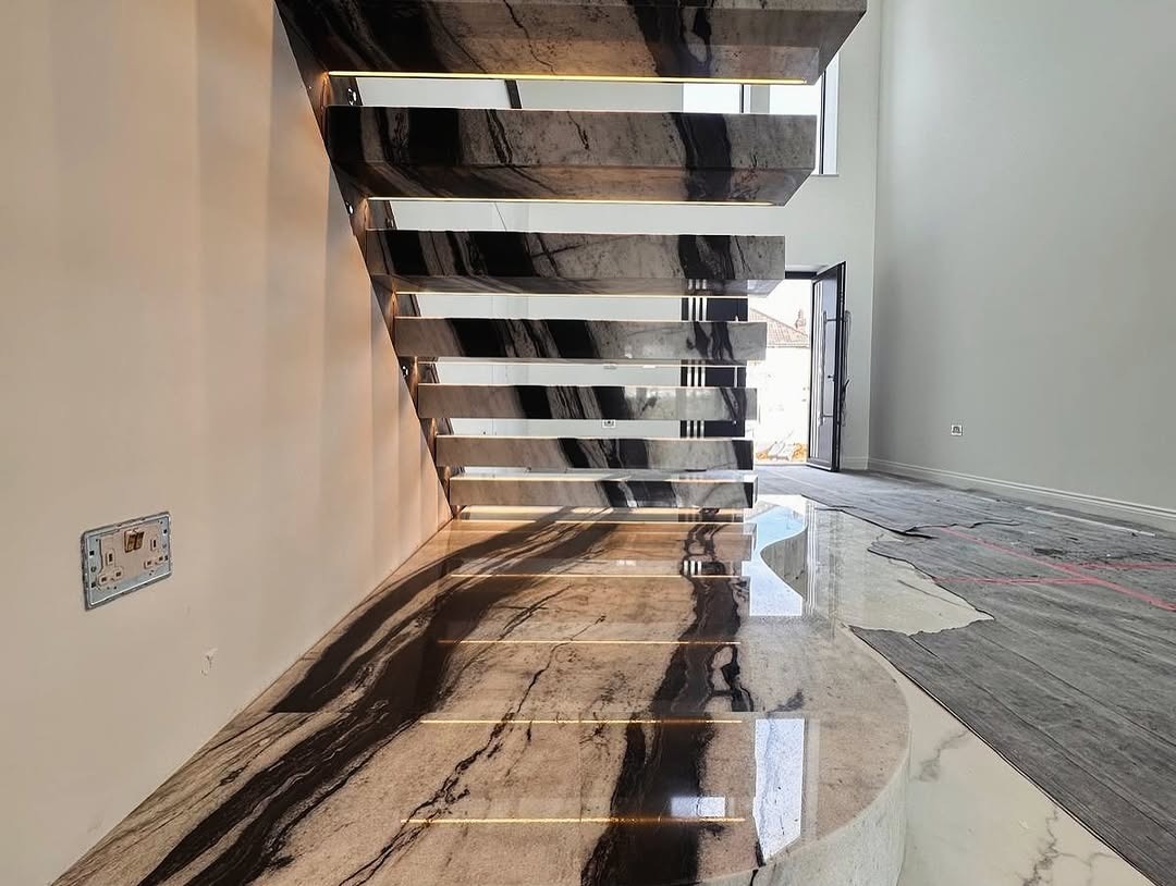 Panda White marble slab sample showing white background with bold black veining – KML Worktops